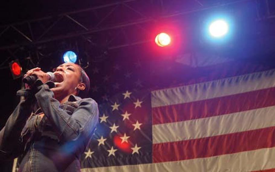 Tichina Arnold, best known for her role as Pam on the TV series “Martin,” belts out a stirring rendition of “Amazing Grace” during a United Service Organizations holiday show this month at RAF Lakenheath.