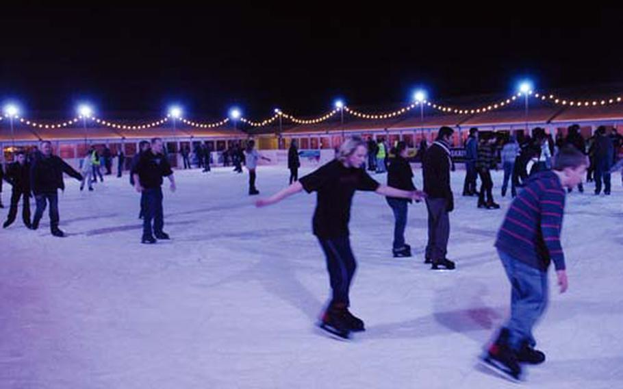 Skaters enjoy the rink at Cambridge on Ice, which runs through Sunday.