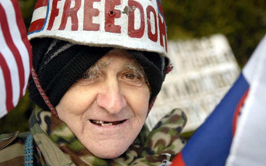 Franz Jansen, a 73-year-old Slovenian immigrant, talks about what has become a lifelong passion — expressing his thanks for American soldiers in Europe — Tuesday outside his house near Baumholder.