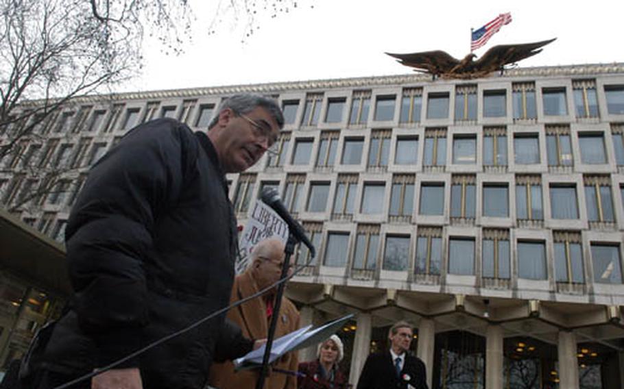 David Harrold, with the London Guantanamo Campaign, speaks to a small crowd that gathered outside the U.S. Embassy on Sunday calling for the closure of the detention facility at U.S. Naval Station Guantanamo Bay.