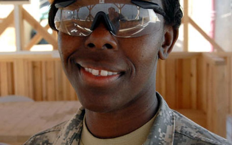 First Lt. Nakesha Moultrie, of Company A, 225th Brigade Support Battalion, in Iraq, says it&#39;s "up to you to climb that [career] ladder or not. It does not depend on your ethnic background."