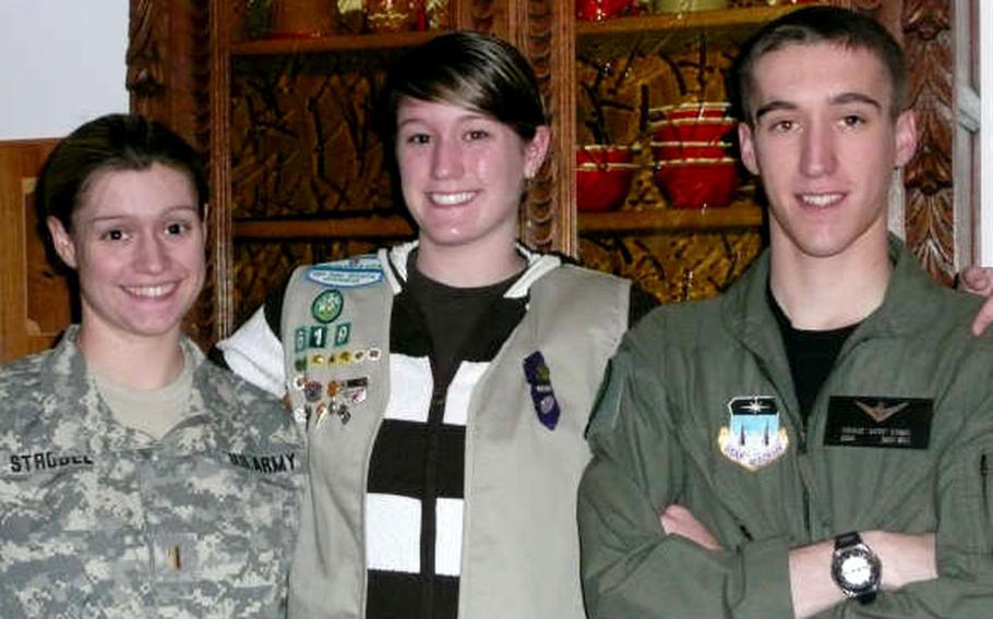 Army 2nd Lt. Kirstin Strobel, left; sister Jamie and their brother, Nicholas, an Air Force Academy cadet, have all reached the highest level in Scouting.