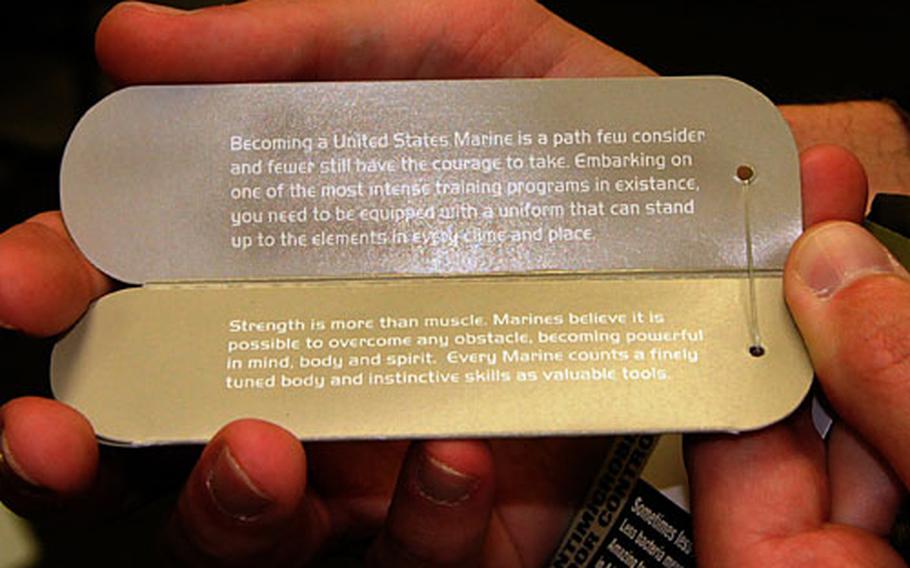 The tags of the Corps&#39; new running suits includes motivational statements of what it means to be a Marine.