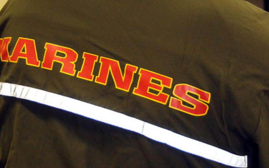 This will be a common look once all 1,200 Marines with Headquarters and Service Battalion, Marine Corps Bases Camp Butler, begin physical training in the Corps&#39; new running suits.