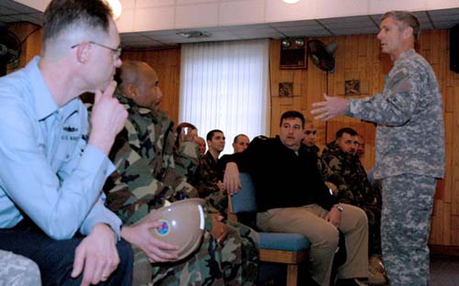 Gen. Walter Sharp, the commander of U.S. Forces Korea, talks with sailors at Chinhae Naval Base about the long-term effects of South Korea taking wartime control in 2012.