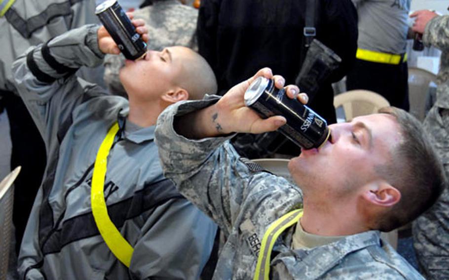 Football fans, beer lovers in Iraq
        crowd around for free brew | Stars and Stripes