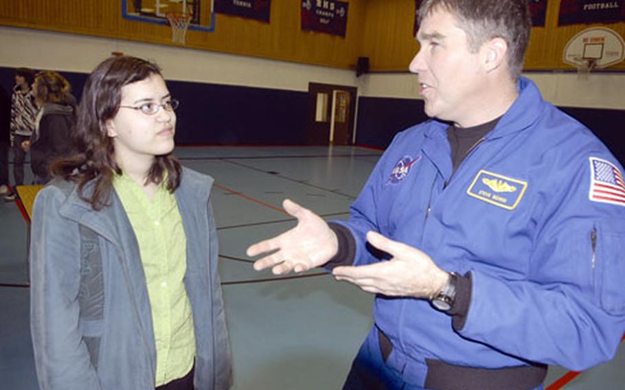 Bowen talks to Ramstein American High School senior Adela Stammerjohan.