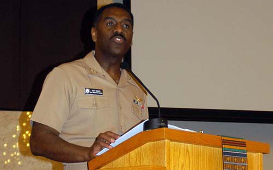 Vice Adm. Anthony Winns, naval inspector general, addresses a crowd at the Chapel of Hope on Yokosuka Naval Base, Japan, on Wednesday. Winns was the guest speaker for the base's Black History Month celebration.