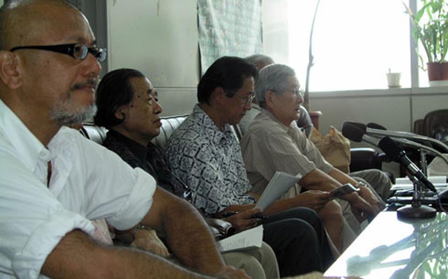 Okinawan scholars voice their objections during an August 2008 press conference about a Marine Corps airfield planned on Camp Schwab to replace Marine Corps Air Station Futenma.