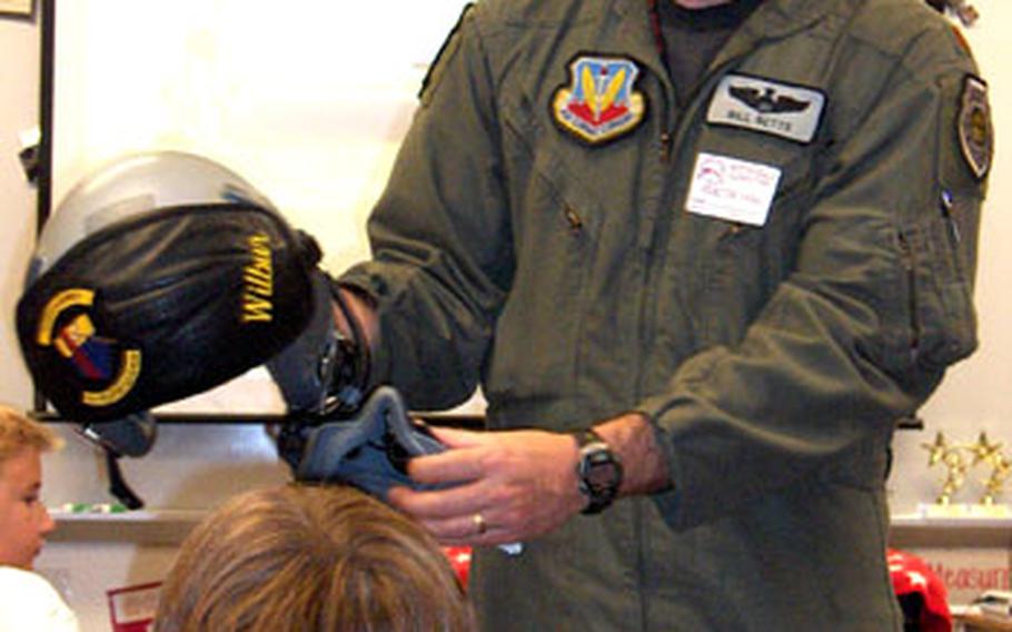 Maj. William Betts talks about his job during a visit to his son James' school.