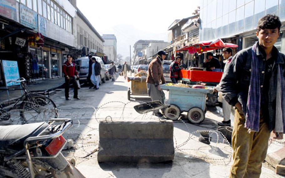 "Chicken Street" offers a more traditional selection of Afghan goods, mainly aimed at tourists — though few appeared to be in evidence during a visit in late January. Makeshift security barriers have been put up on the street.