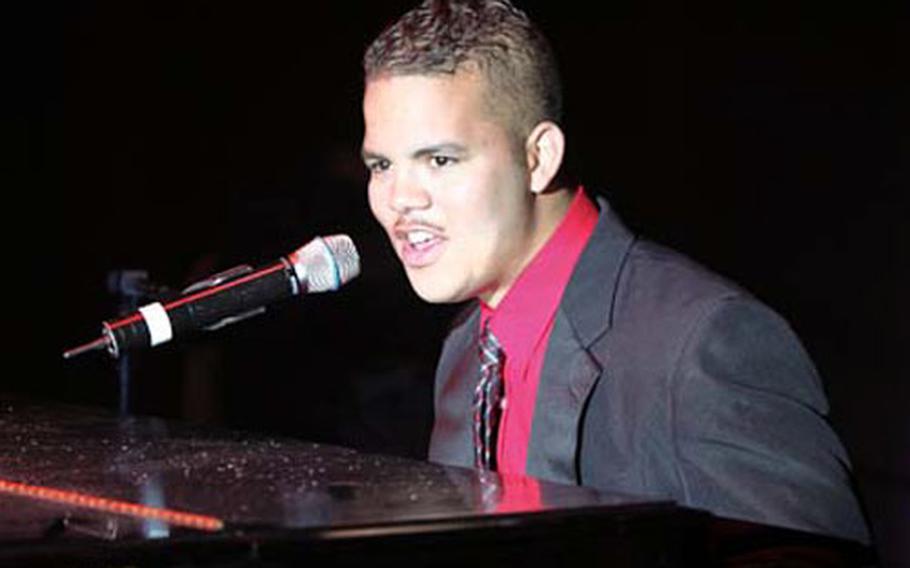 At Lackland Air Force Base, Texas, last month, Airman 1st Class Malcolm Hudson sings “My Funny Valentine” during a make-or-break audition for the U.S. Air Force’s traveling entertainment team, Tops in Blue. Hudson, a munitions airman with the 8th Fighter Wing at Kunsan Air Base in South Korea, later got word he’d been selected for a one-year tour as a member of the hard-to-get-into team. For a video of Hudson's audition, see the link at the top of the story.