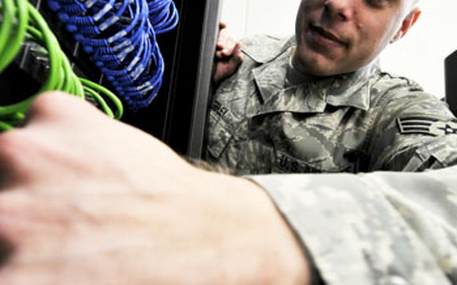 Senior Airman Jesse Sibley, of the 35th Communication Squadron’s Blue Team, works on a squadron server earlier this month at Misawa Air Base, Japan. The Misawa Blue Team helps people recognize threats to the computer network infrastructure and properly report suspicious activity.