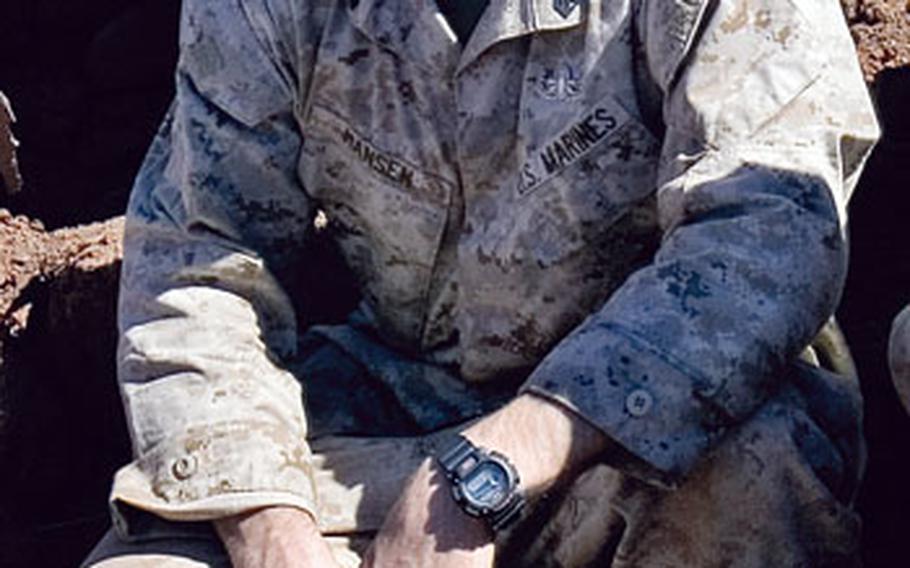 Staff Sgt. Daniel Hansen trains for explosive ordnance disposal during an exercise in Australia in August. Hansen was killed on Feb. 14 while deployed to western Afghanistan.