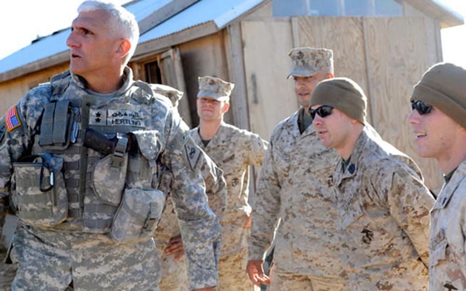 Maj. Gen. Mark Hertling visits Marines from Delta Company, Anti-terrorism Battalion, 4th Marine Division, at Joint Security Station Sharqat, Iraq, in November, 2008.