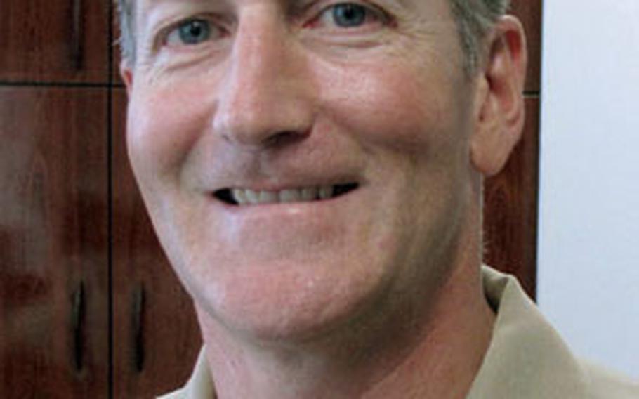Capt. Greg Belanger leads the U.S. Naval Legal Service Ofiice Pacific, which recently recieved the American Bar Association Distinguished Service Award for its legal assistance to military personnel.