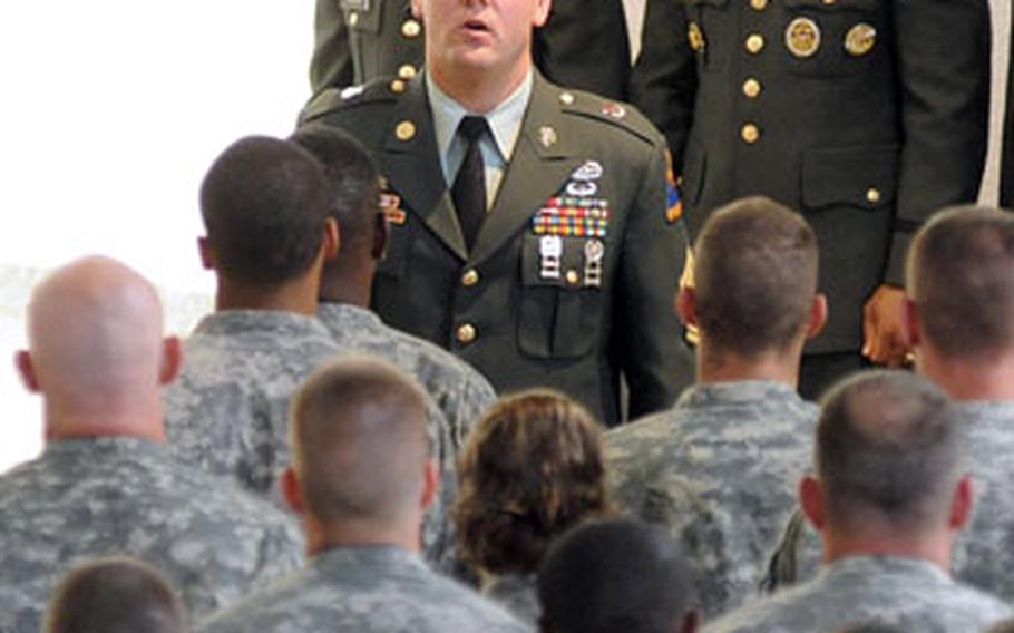 Robert Bundrant, 47th Forward Support Battalion first sergeant, calls out the final roll call for the three crash victims.
