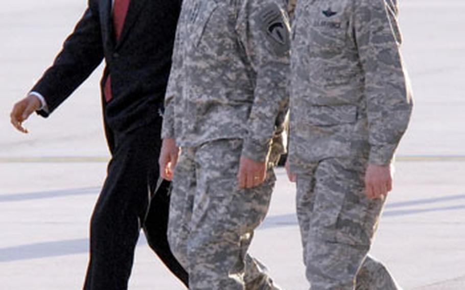 U.S. Army Europe commander Gen. Carter Ham, center, and former U.S. Air Forces in Europe vice-commander Maj. Gen. Marc Rogers escort President Barack Obama to Air Force One after the President's visit to Ramstein Air Base and Landstuhl Regional Medical Center on Friday evening.