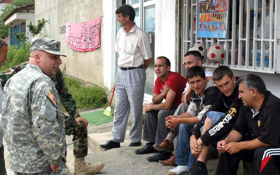 Capt. Eddie Morgan, a California National Guardsman who leads a Liaison Monitoring Team in Kosovo, tries to sense the attitude of local residents to a potential return of refugees to the village of Perlepnica.