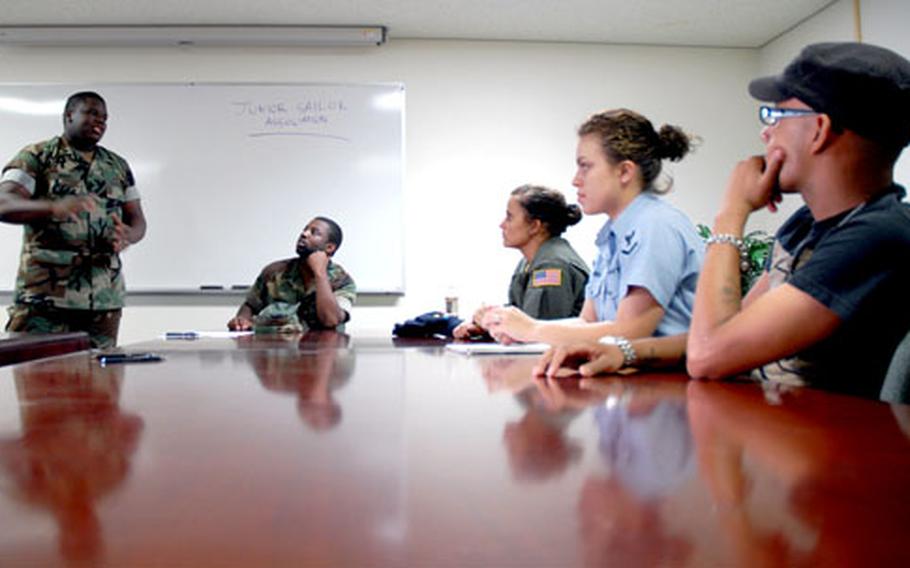 Petty Officer 2nd Class Jamal Borden talks during the first meeting of the new Naval Air Facility Atsugi Junior Sailor Association June 4 on base. Since the first meeting, the group has grown from eight sailors to about 40.