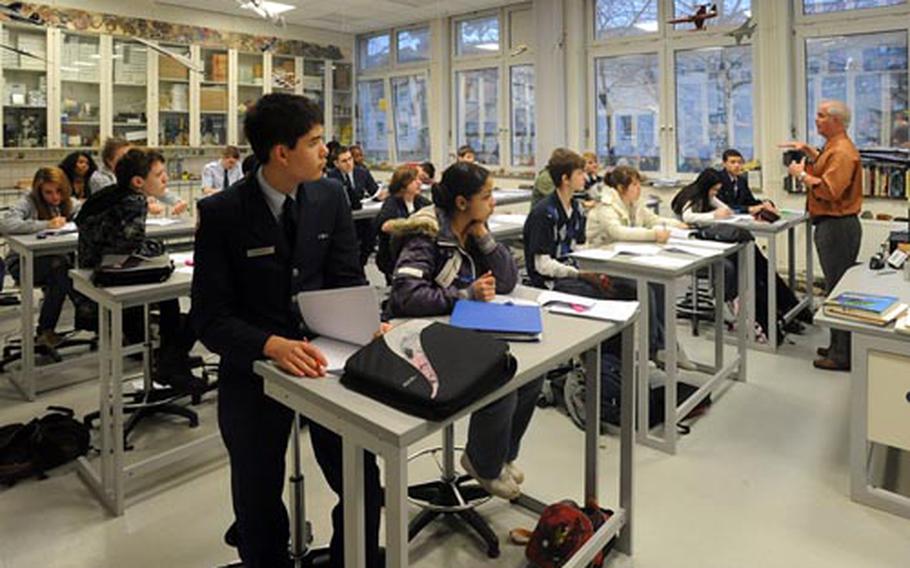 Kaiserslautern High School students listen as their physical science teacher Robert Careless explains how transformers work in March. If approved by Congress, students could be attending a new Kaiserslautern High in the next few years.