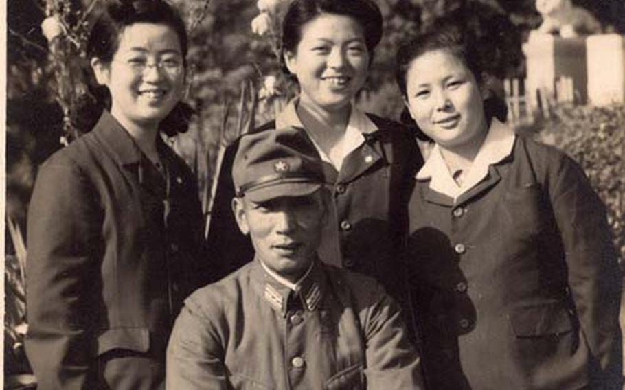 A 15-year-old Suzu Kuriha (right) poses for a picture with the senior executive officer of Camp Zama and other co-workers in 1945. During that year, Kuriha served at the secretary for Lt. Gen. Kenzo Kitano, the commandant of the Japanese Imperial Military Academy at Sobudai.