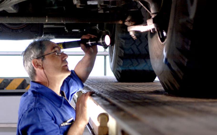 Carlos Ferreira, a Warehouse Services Agency employee at the U.S. Air Forces in Europe Central Region Storage Facility at Sanem, Luxembourg, inspects a heavy-duty forklift for hydraulic leaks. The depot is tasked with not only storing war reserves, but also securing, repairing, and maintaining the equipment, ensuring it’s ready to be shipped on a dime.