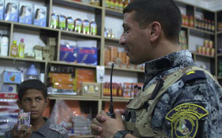 Americans are pushing the Iraqis such as this lieutenant with the National Police to take the lead in planning patrols and talking with residents about security problems. He recently got a tip about a home used for storing weapons but decided to gather more information before acting on it.
