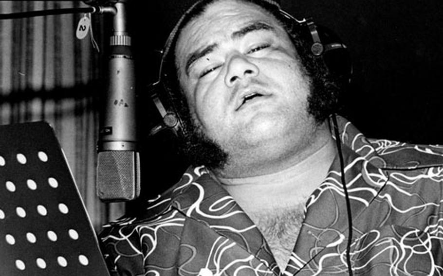 Jesse Kuhaulua, also known as Takamiyama, belts out a tune during a recording session in Tokyo in 1977.