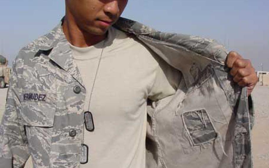 Air Force officials say that a new lightweight version of the Airman Battle Uniform blouse won’t be available until the fall of 2010. The service decided to offer the new uniforms because airmen said the ABU blouse was too hot in deployed locations. In November 2007, Senior Airman Michael Bermudez, assigned to the 732nd Expeditionary Security Forces Squadron in Iraq, showed the inside of his uniform with the map pocket removed to make the uniform cooler.