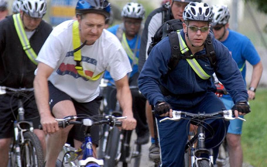 Soldiers from the Vilseck Heatlh Clinic participate in a bicycle PT ride near Vilseck, Germany, on Thursday.