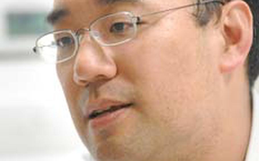 Air Force Lt. Col. (Dr.) Raymond Fang, Landstuhl Regional Medical Center's trauma director, seen during an interview in August of 2007.