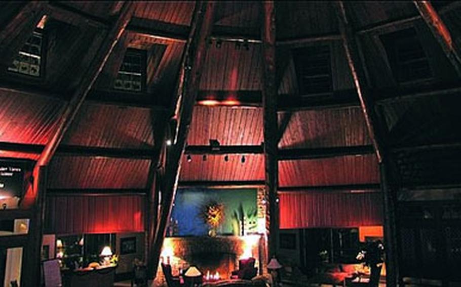 Screengrabs show the interior and exterior of Chicoma Lodge, the online retreat for veterans who play Second Life.
