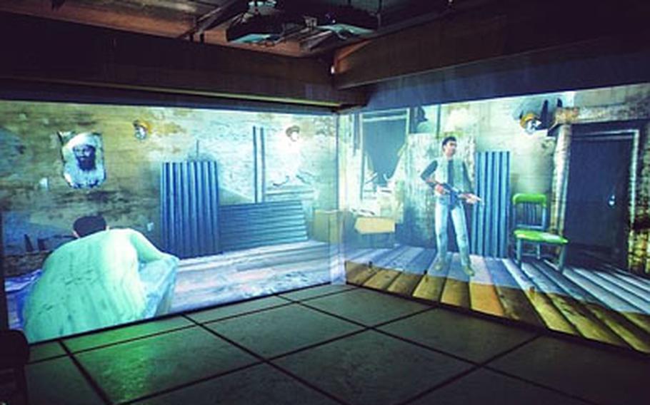 The shoot house in Vicenza, Italy, is now equipped with the most modern technology available. Scenarios from the "America’s Army" Live Fire Virtual Targeting system are projected on paper rolls strung up in front of walls.