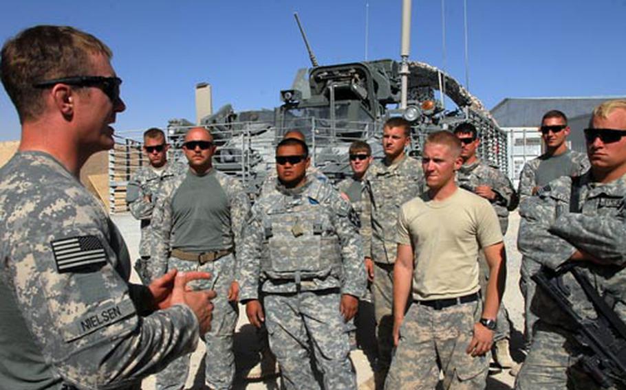 First Lt. John Nielsen of the 2nd Platoon, 52nd Infantry Regiment, 5th Stryker Brigade Combat Team of Fort Lewis, Wash., briefs his soldiers Tuesday for an afternoon mission patrolling Qalat, the capital of Zabul province in Afghanistan. The Stryker brigade arrived in the province for the first time roughly a month ago, representing an increase in troop strength in an area of Afghanistan that previously did not get a lot of military attention.