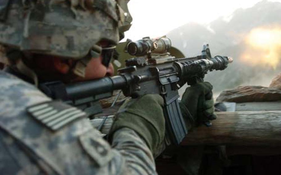 A 1st Battalion, 32nd Infantry Regiment soldier fires an M4 rifle during a battle with insurgent forces in Barge Matal, Afghanistan, in July. While the military has taken steps to treat mental health disorders stemming from combat, there are no attempts being made to count the number of soldiers who visit combat stress clinics or track their long-term mental health.