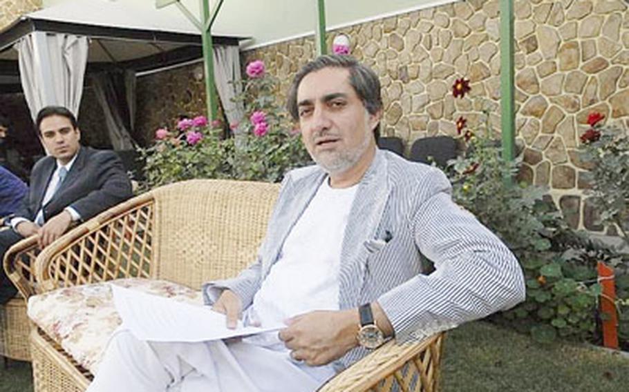 At his home in Kabul, Dr. Abdullah Abdullah, the main opposition candidate in the disputed Afghan presidential elections, holds a list of polling sites where he claims widespread fraud took place. Abdullah warned that while additional troops are welcome, they will not fix the widespread corruption that threatens stability.