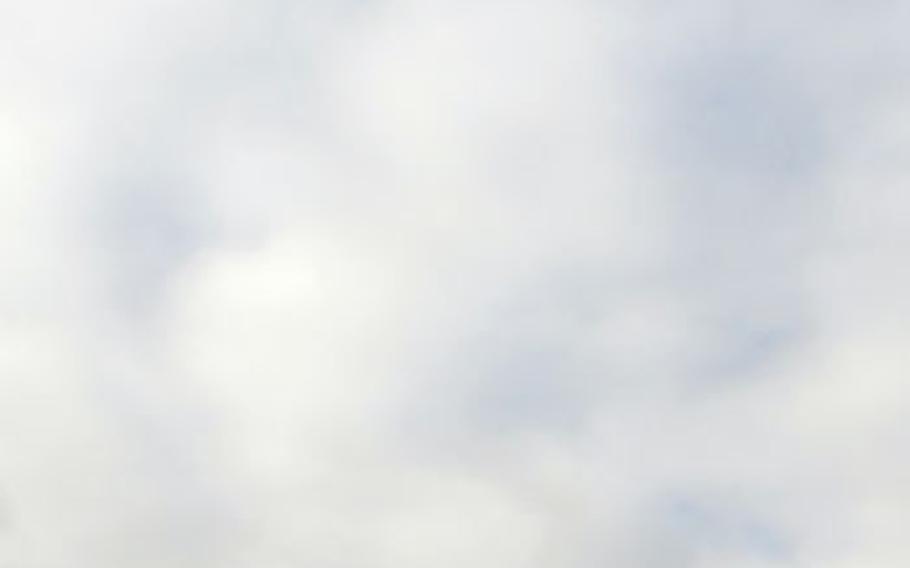 Ramstein-Miesenbach mayor Klaus Layes watches a C-5M Galaxy take off from Ramstein Air Base, Germany, on Wednesday.