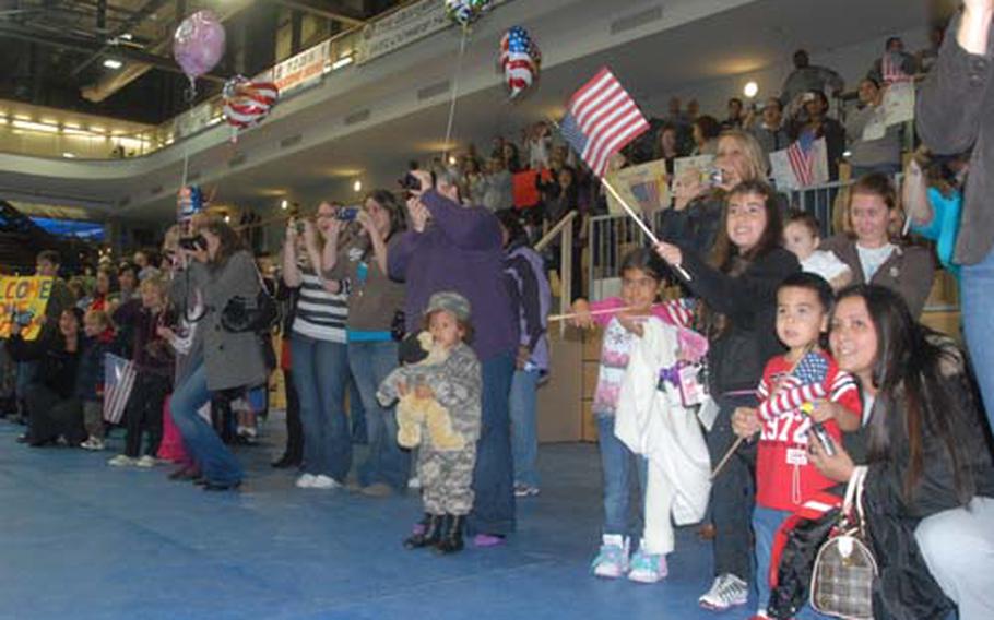 Families welcome soldiers with the 172nd Infantry Brigade back to Grafenwöhr on Monday after their yearlong deployment to Iraq.