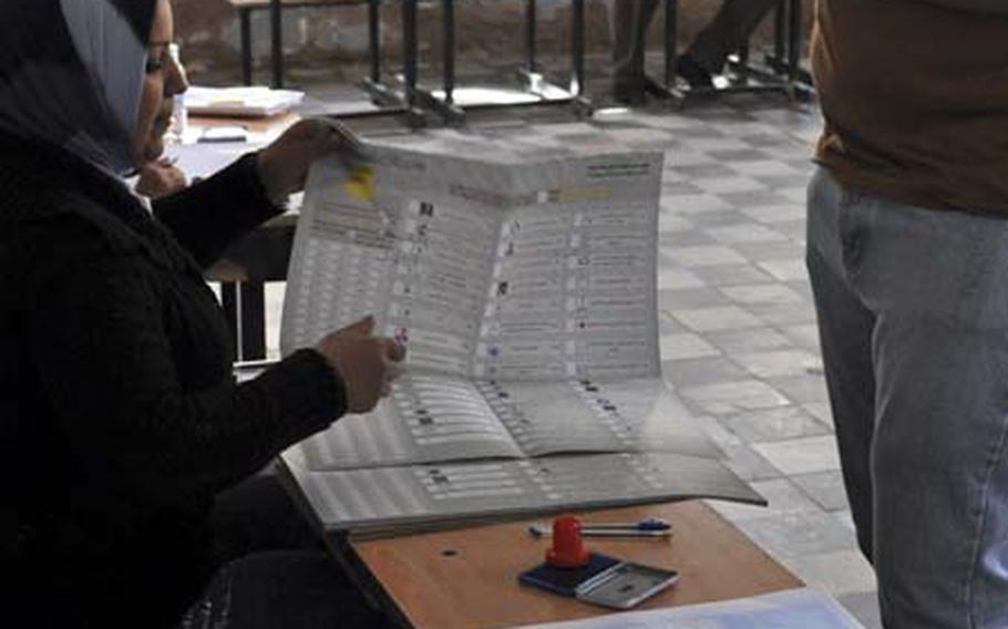 Election officials reported low turnout in Baghdad on Sunday morning amid a series of explosions but said turnout increased as the day went on. Initial reports from elsewhere in Iraq indicated strong turnout, though it may be a day or two for the official numbers.