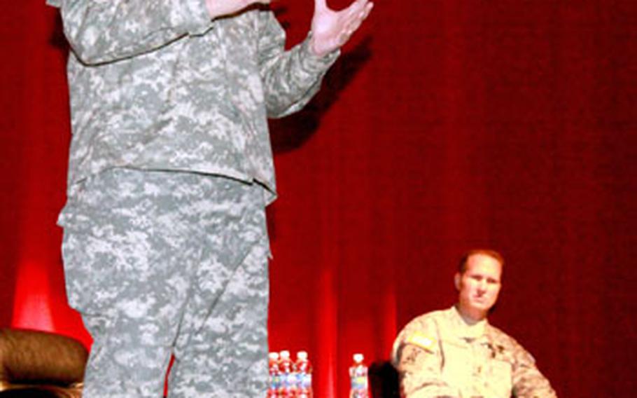 Lt. Gen. Jack Stultz, U.S. Army Reserve commander discusses with soldiers the ongoing changes in the reserves at the Camp Zama community center on Thursday.