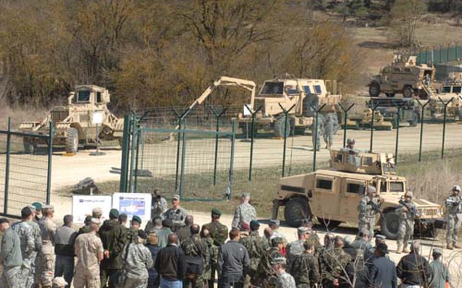 Delegates to a Counter-IED Conference at Hohenfels toured a U.S. IED academy on Wednesday, observed soldiers manning a checkpoint and checked out engineer route-clearance vehicles.