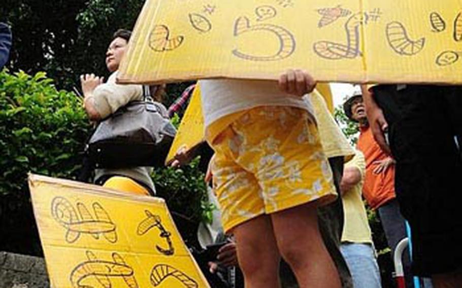 Young and old turned up Tuesday in Ginowan to voice their concerns and anger over the decision by Prime Minister Yukio Hatoyama not to move U.S. Marine air units off Okinawa.