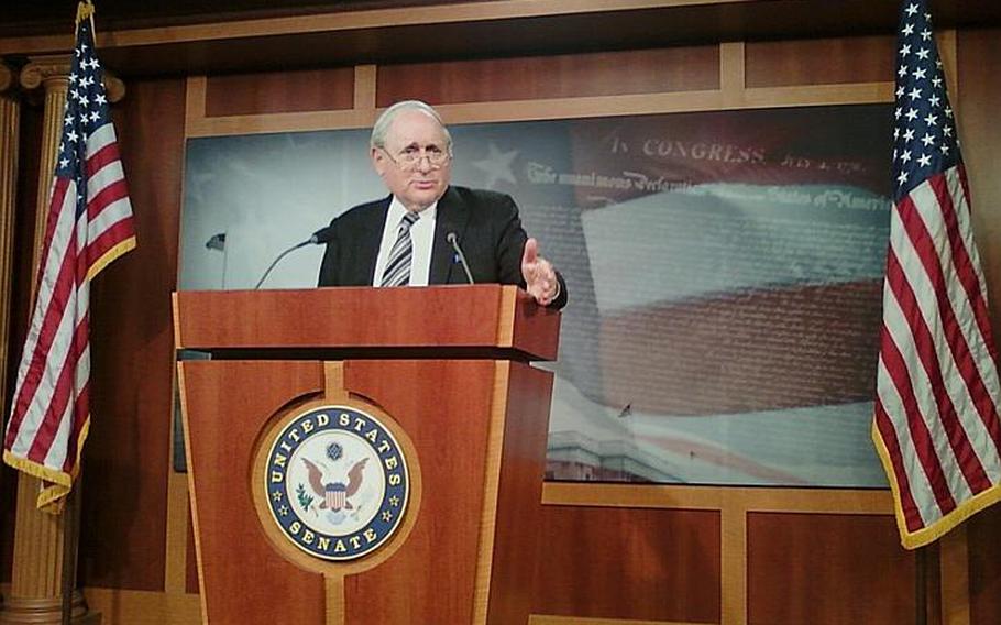 Senate Armed Services Committee Chairman Carl Levin, D-Mich., speaks to reporters Friday about details of his committee's draft of the fiscal 2011 defense authorization bill. Among other military funding issues, the measure proposes a 1.4 percent across-the-board pay raise for military personnel next year, though troops in certain specialties could see more money.