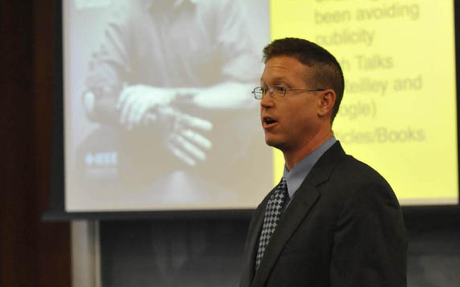 Jon Kuniholm pitches his business idea, Stumpworks, at the 2009 Entrepreneurship Bootcamp for Veterans at Syracuse University. Kuniholm, a former Marine, lost his arm to a roadside bomb in 2005 in Iraq.