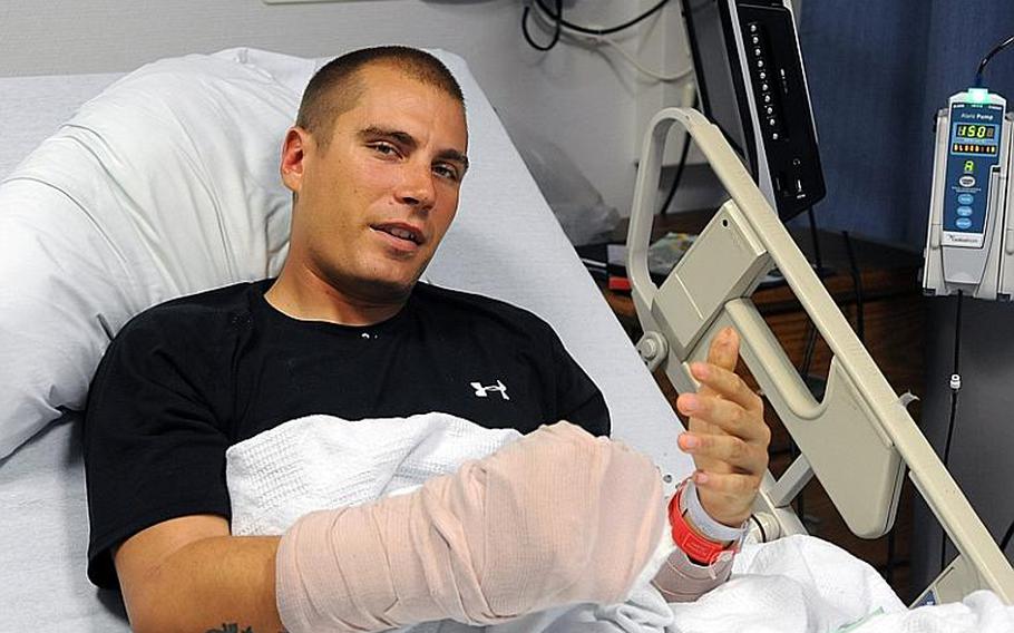 Sgt. Chris Champion, 25, hospitalized at Landstuhl Regional Medical Center, talks about the day a mine blew off his lower left leg in Afghanistan&#39;s Arghandab Valley. Champion, a soldier with the 4th Infantry Division's 1st Brigade Combat Team also suffered wounds to his right leg and hand.