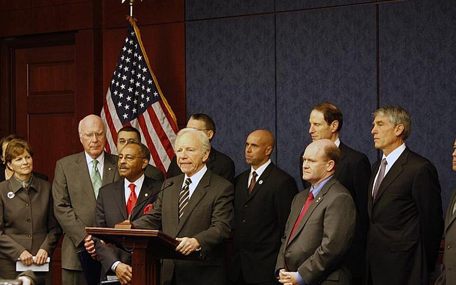 Surrounded by senators and gay rights advocates, Sen. Joe Lieberman, I-Conn., speaks to reporters at a Capitol Hill event Thursday about the chances of repeal the military's "don't ask, don't tell" law this year.