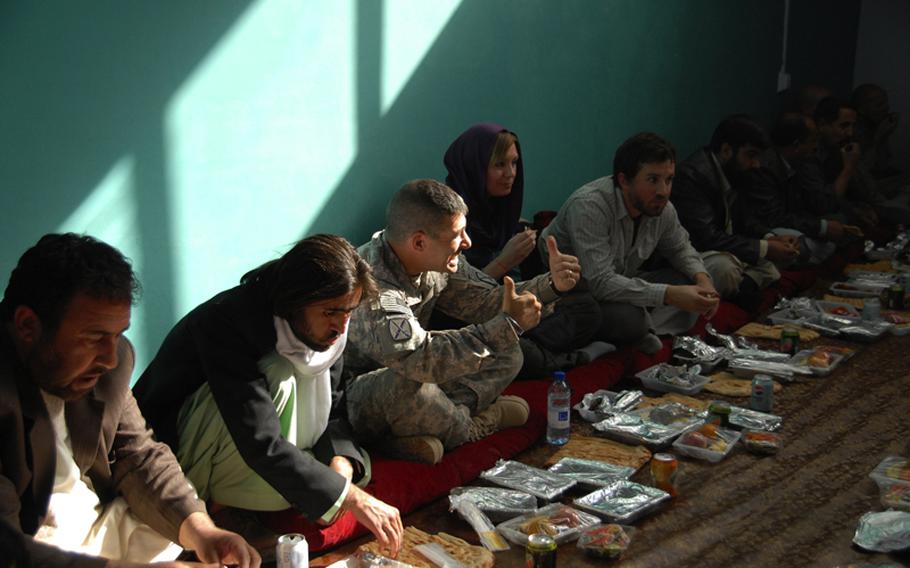 Lt. Col. John Paganini poses for a photo during a luncheon at the Dand District Center last week. The representatives of villages from around the district were there for a meeting with the Dand leadership and the governor of Kandahar.