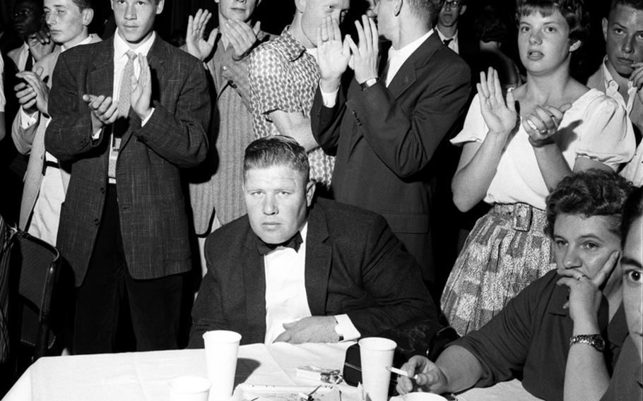 It would appear that not everyone at the dance was a believer in the "magic of rock 'n' roll."