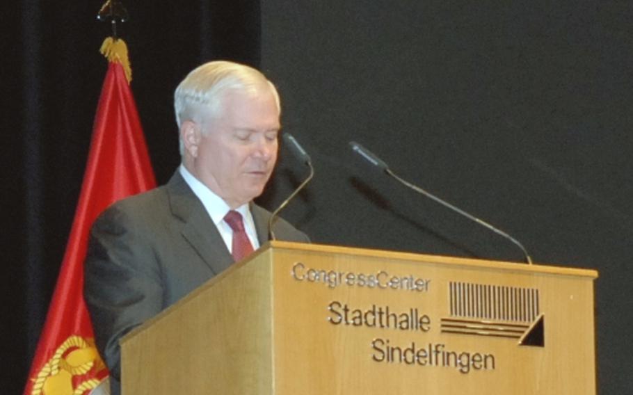 Defense Secretary Robert Gates addresses the crowd during a ceremony Wednesday in Stuttgart, Germany, where Gen. Carter F. Ham assumed command of U.S. Africa Command. Ham replaced Gen. William "Kip" Ward, who served in the top AFRICOM post since the command was formed in 2007.